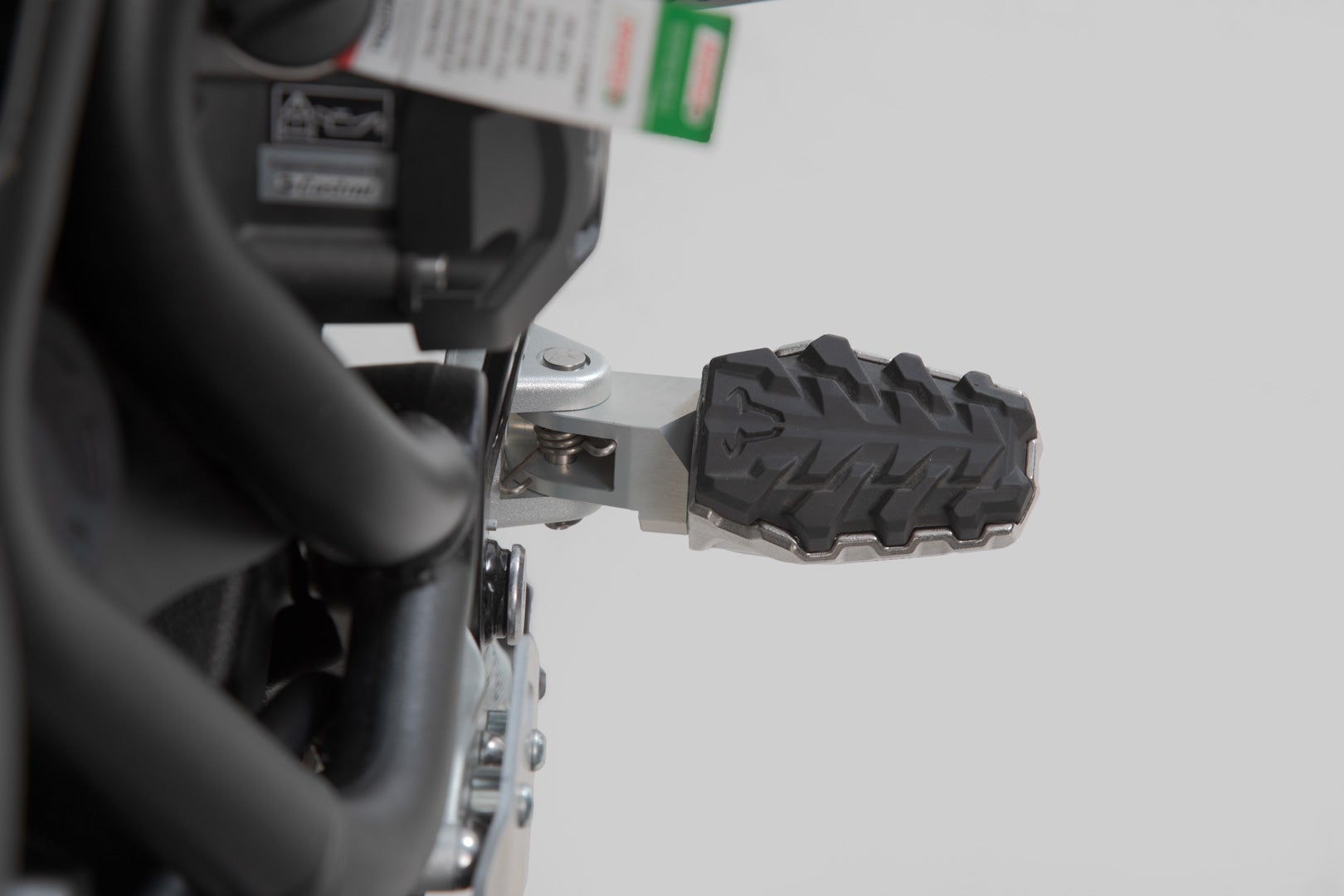 Side view of SW-Motech EVO footrest kit - Triumph Tiger 800/ 900/ 1200, Scrambler 1200.