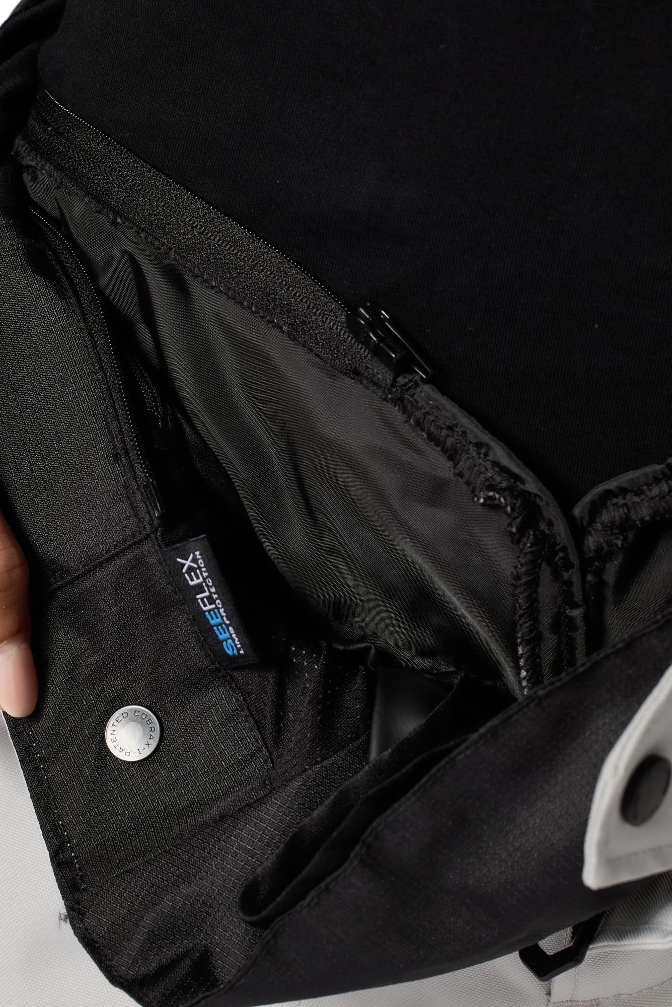 Side view of Revit Outback 5 Bicolor H2O waterproof Ladies Motorcycle Textile Pants