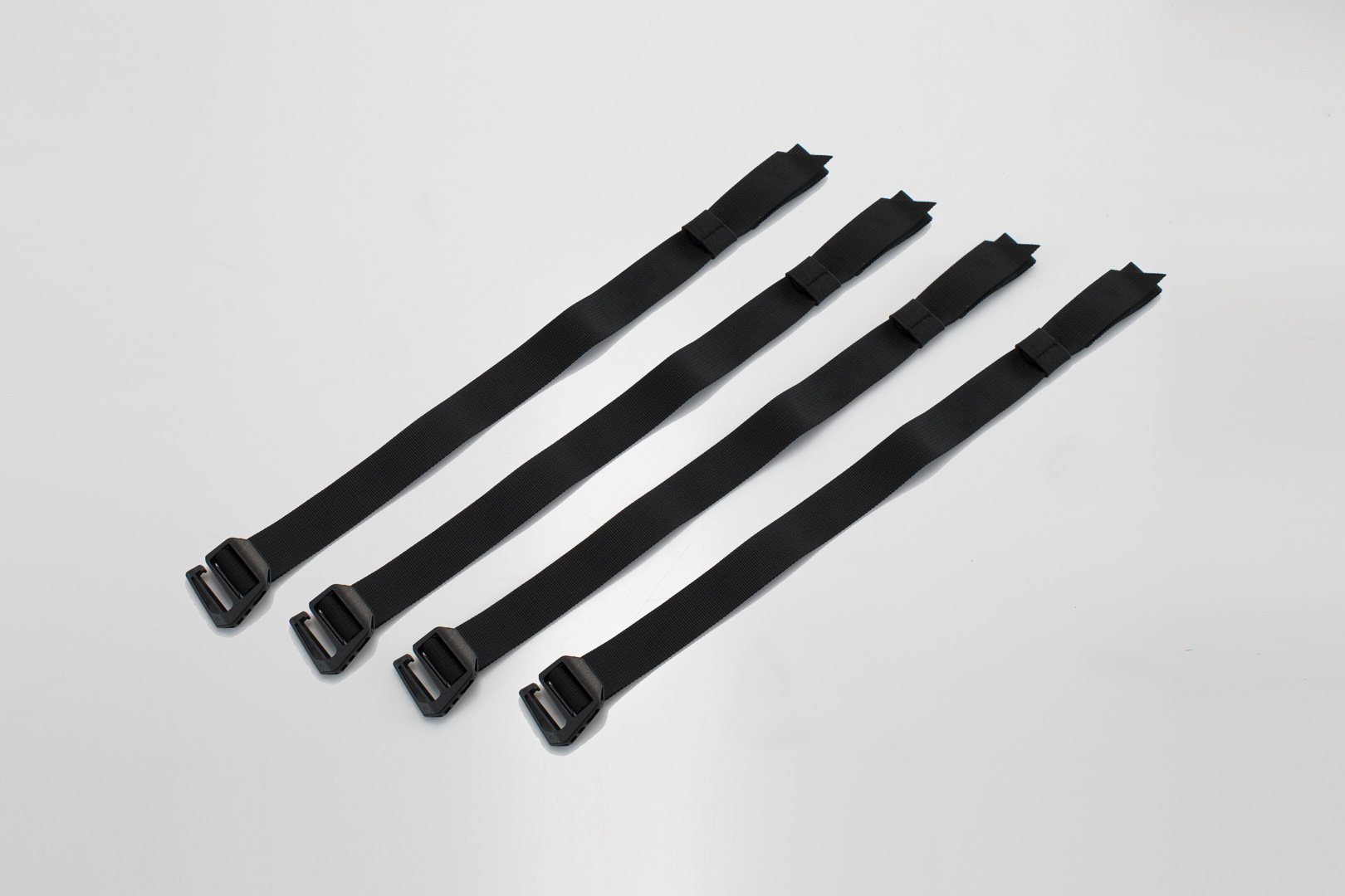 Set de curele SW-Motech SysBag - Negru. 4 curele care se potrivesc. Figura 1