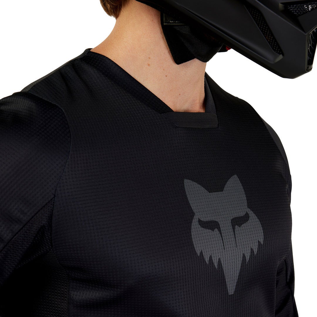 Side view of FOX 180 Blackout 2023 Motocross Jersey