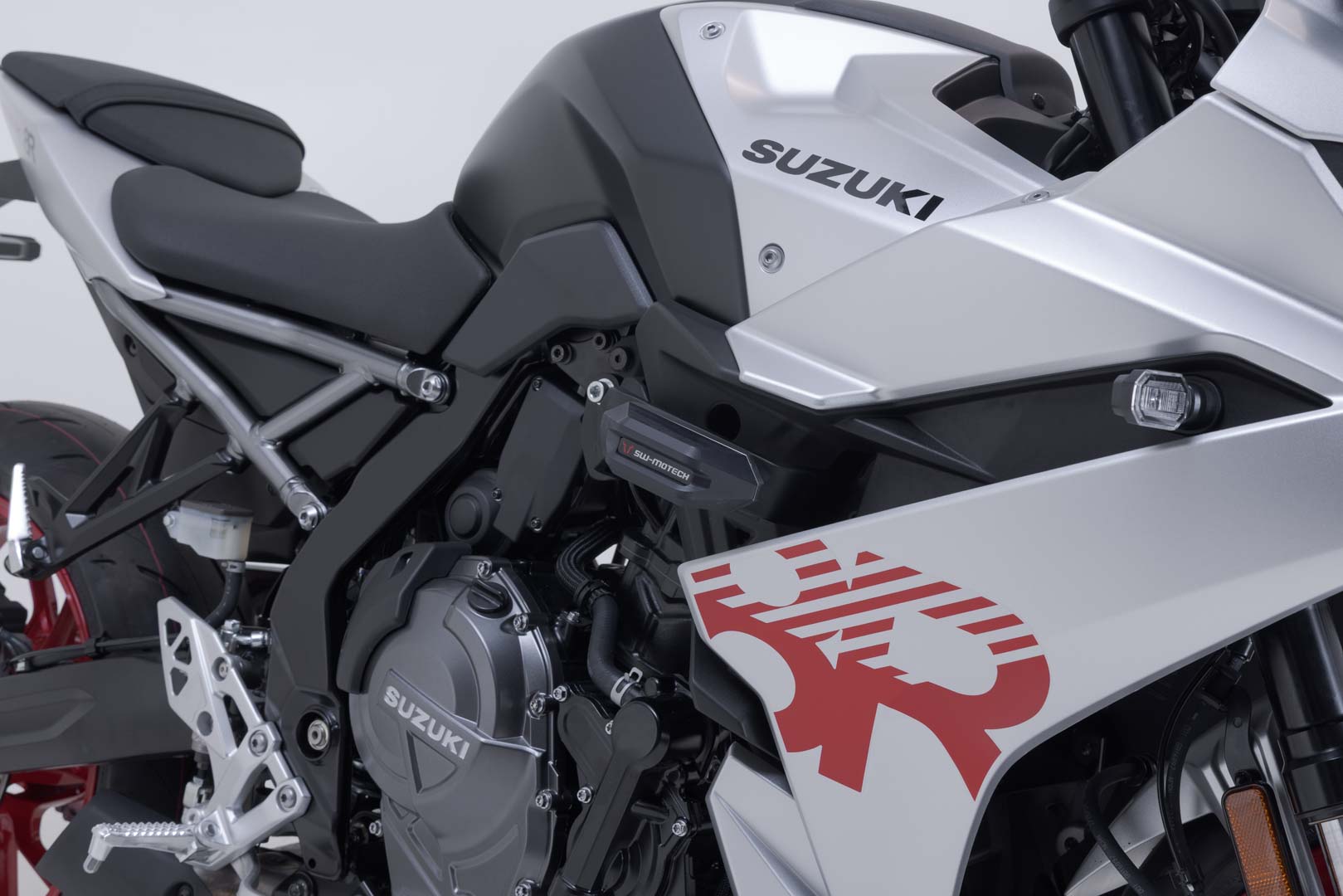 Side view of SW-Motech Frame slider kit - Black. Suzuki GSX-8R (22-25).