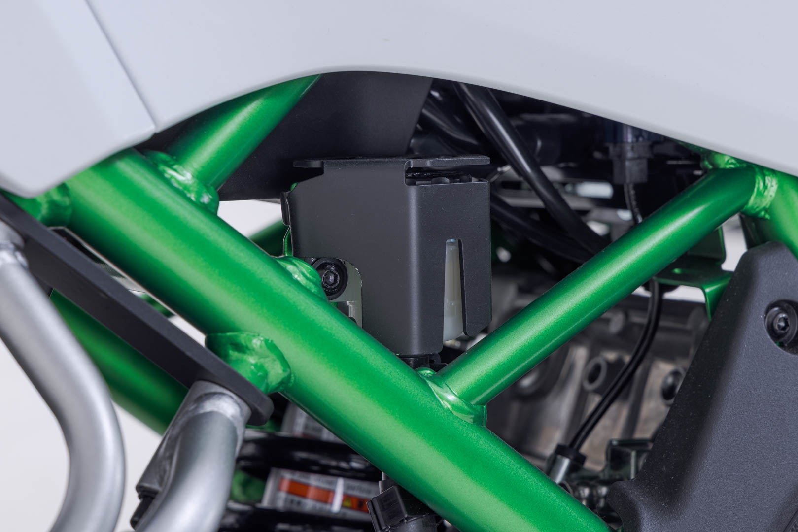 Side view of SW-Motech Brake reservoir guard - Black. Kawasaki KLE500 / KLE500 SE (26-).