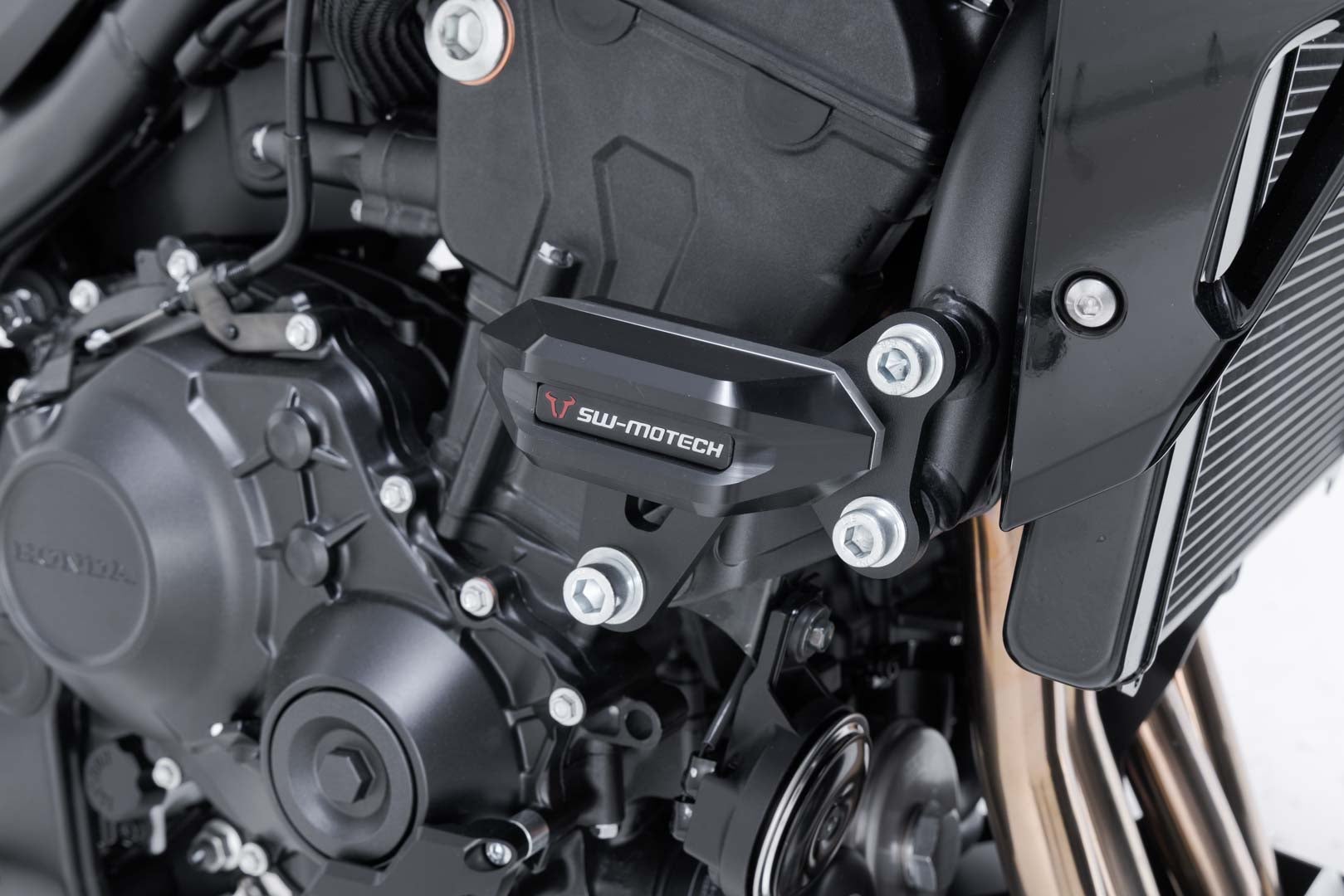 SW-Motech Sturzpad-Kit - Schwarz. Honda CB1000 Hornet / GT (24-). Abbildung 1