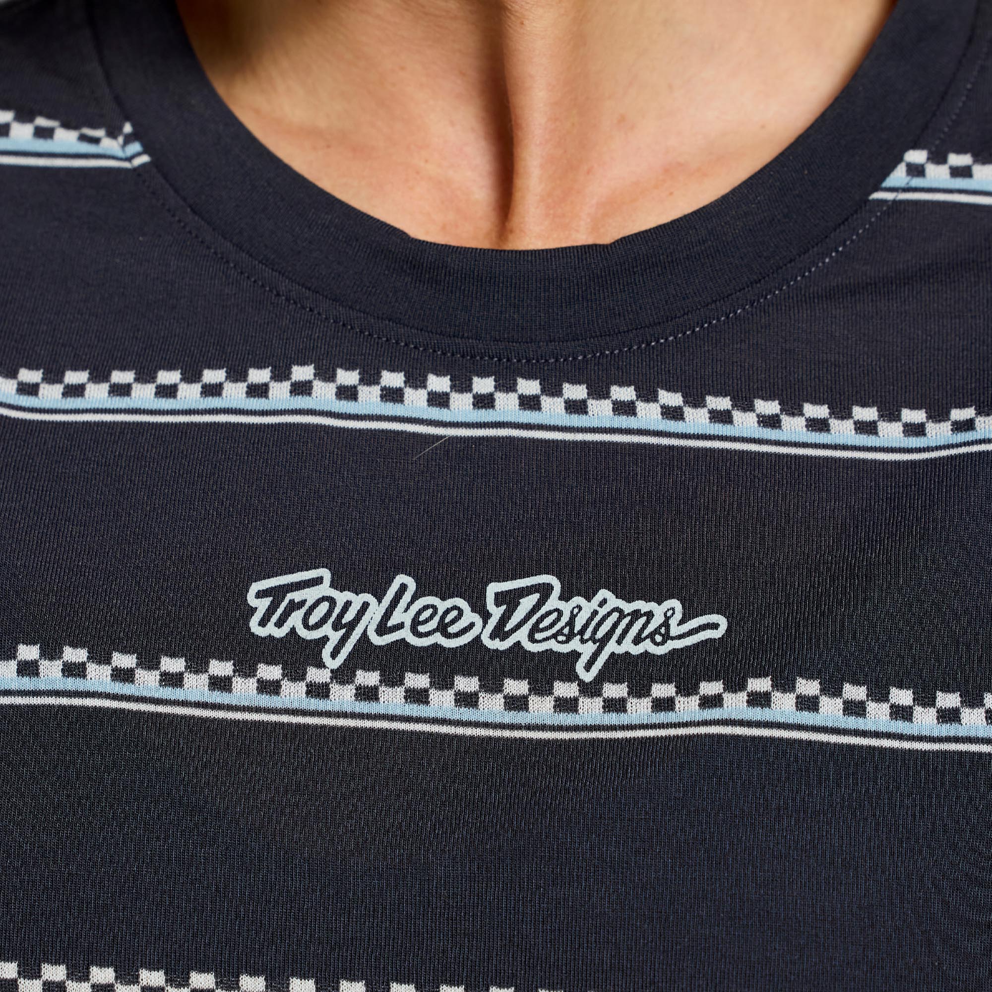 Side view of Troy Lee Designs Lilium Ride Checked Out Ladies Short Sleeve Bicycle Jersey