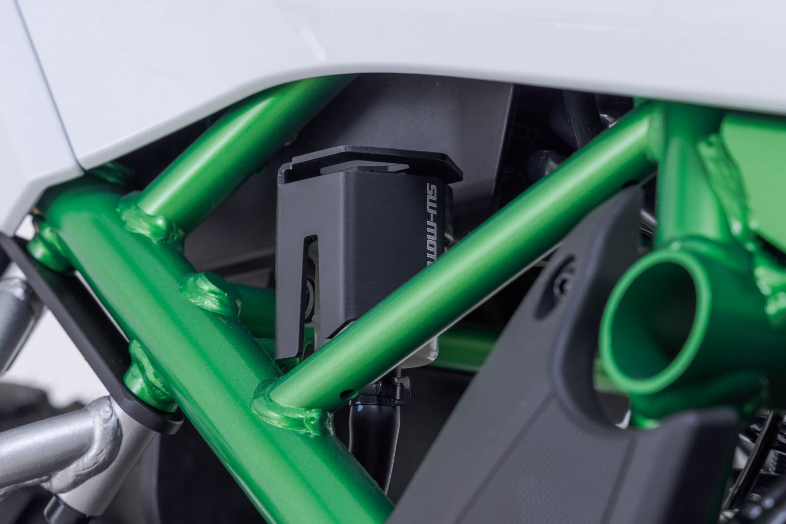 Side view of SW-Motech Brake reservoir guard - Black. Kawasaki KLE500 / KLE500 SE (26-).