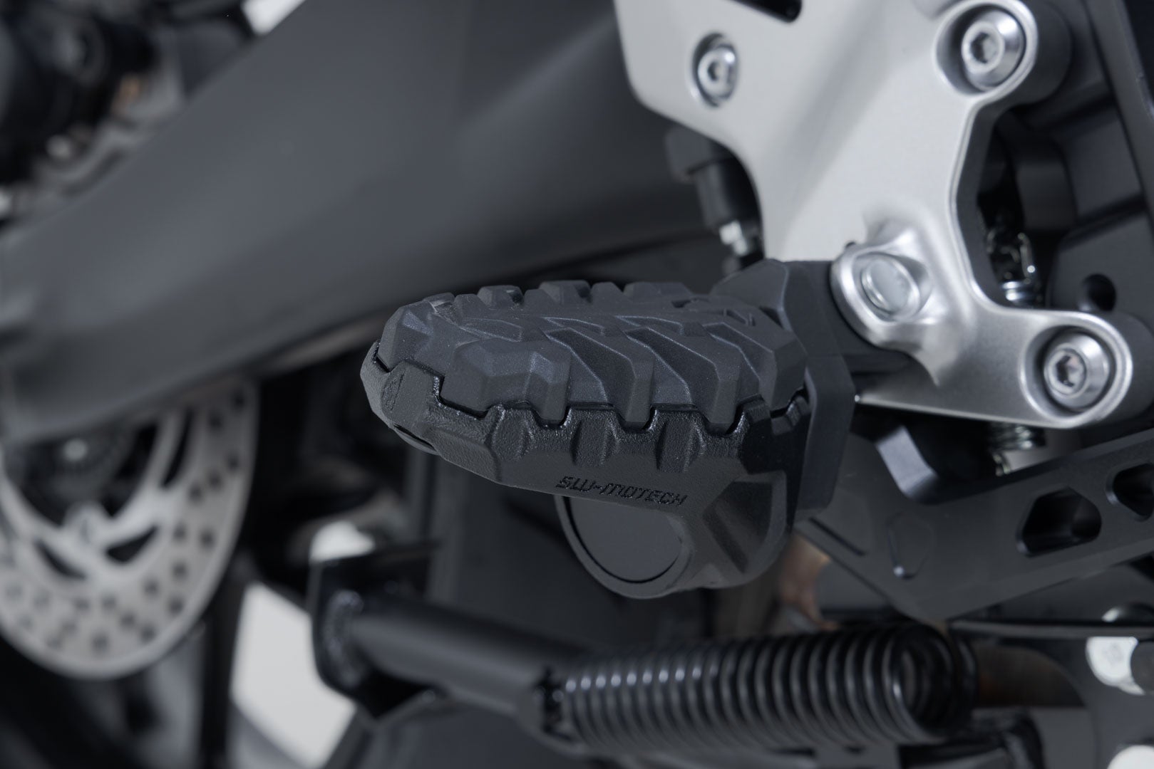 Side view of SW-Motech EVO footrest kit - Black. Yamaha Tracer 9 / GT / GT+ (24-).