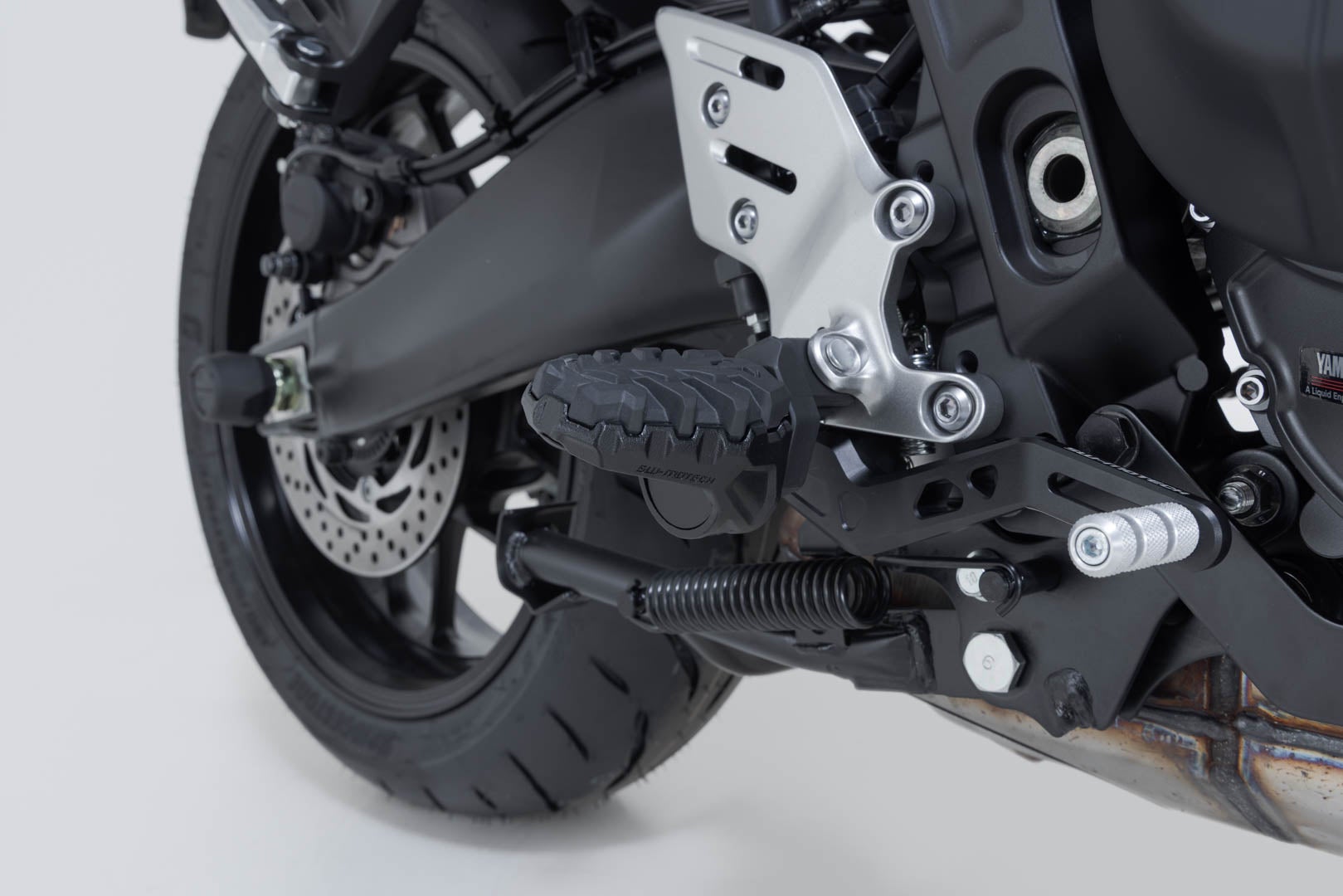 Side view of SW-Motech EVO footrest kit - Black. Yamaha Tracer 9 / GT / GT+ (24-).