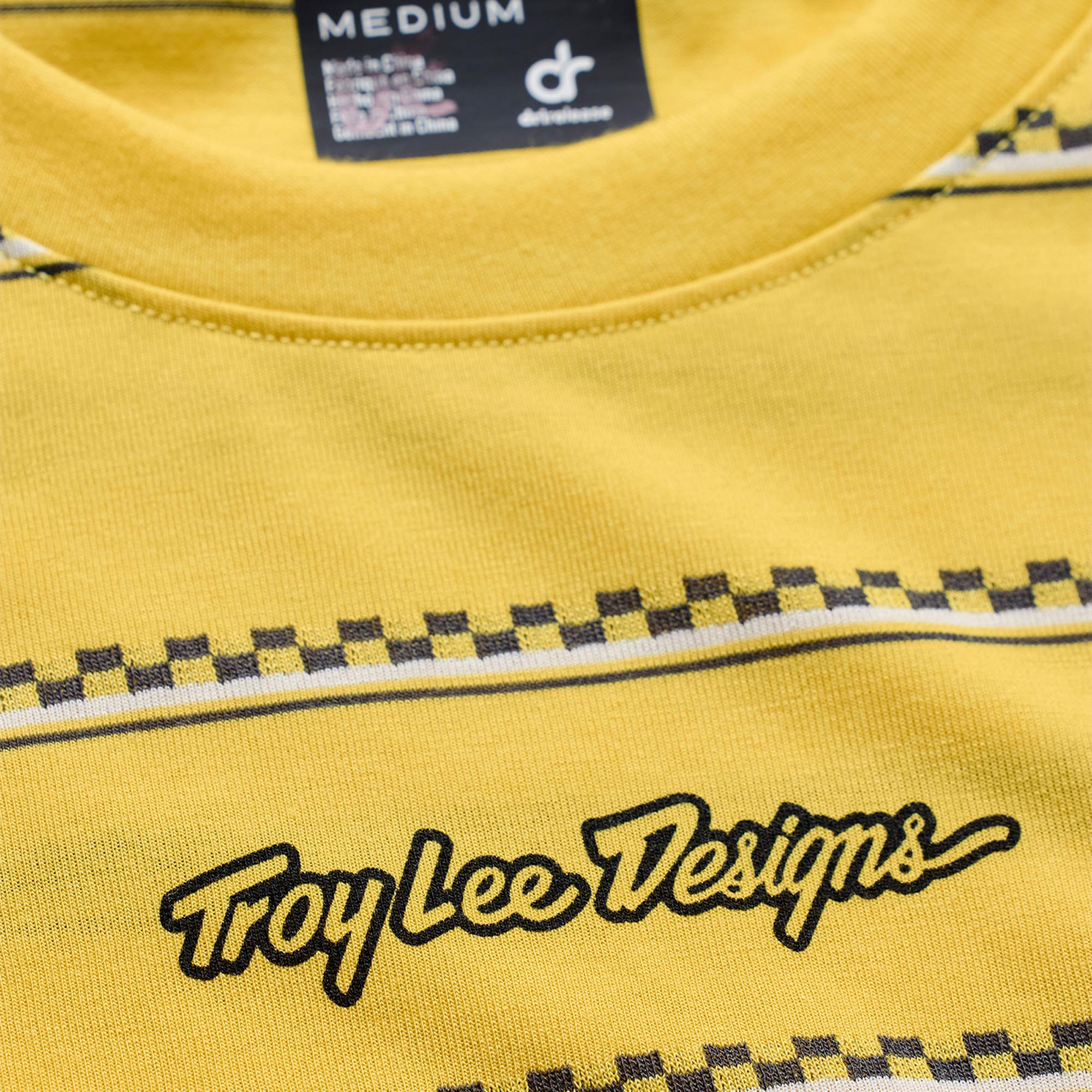 Side view of Troy Lee Designs Skyline Ride Checked Out Short Sleeve Bicycle Jersey