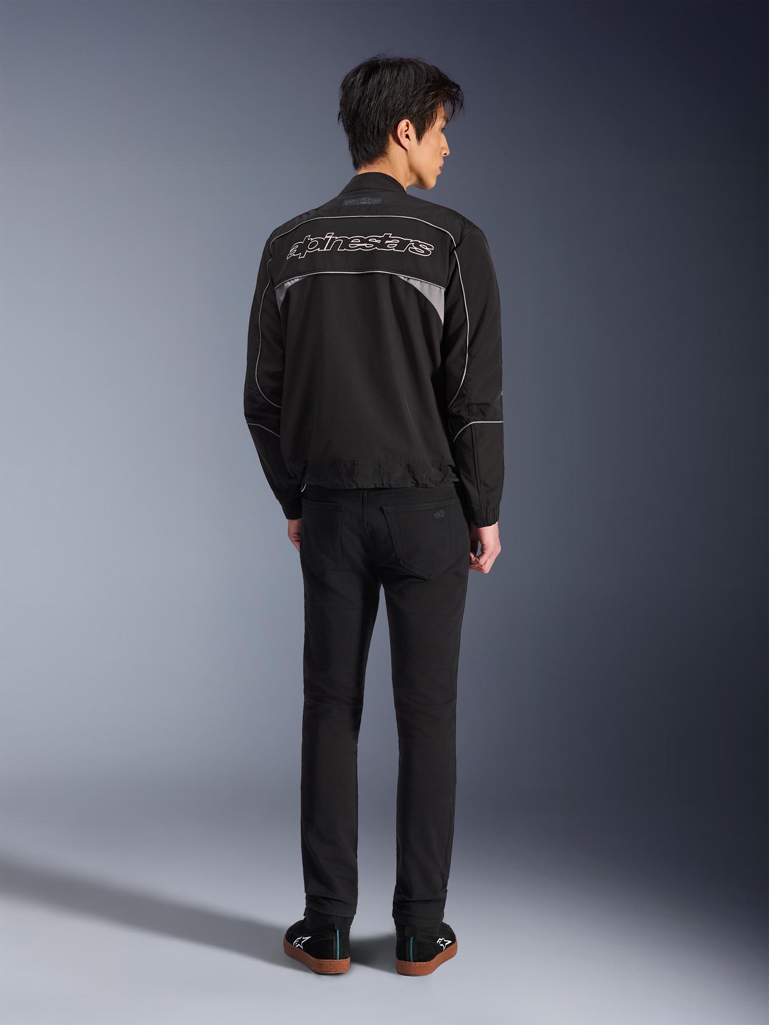 Side view of Alpinestars Unite Motorcycle Textile Jacket