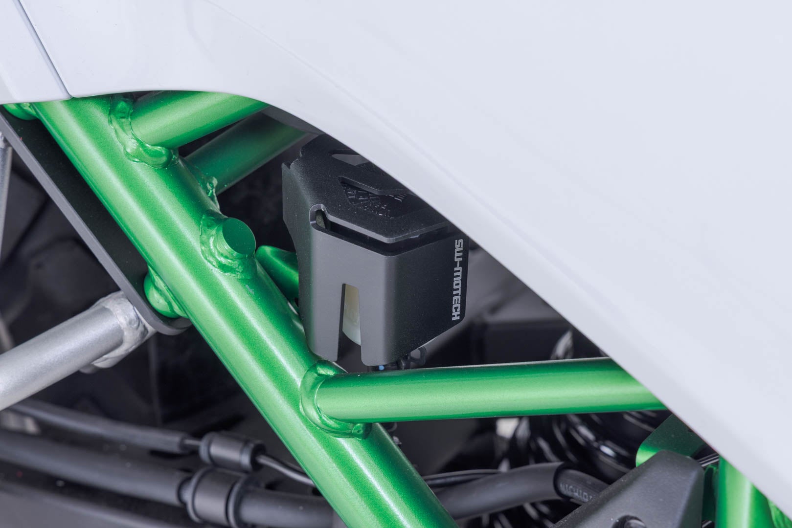 Side view of SW-Motech Brake reservoir guard - Black. Kawasaki KLE500 / KLE500 SE (26-).