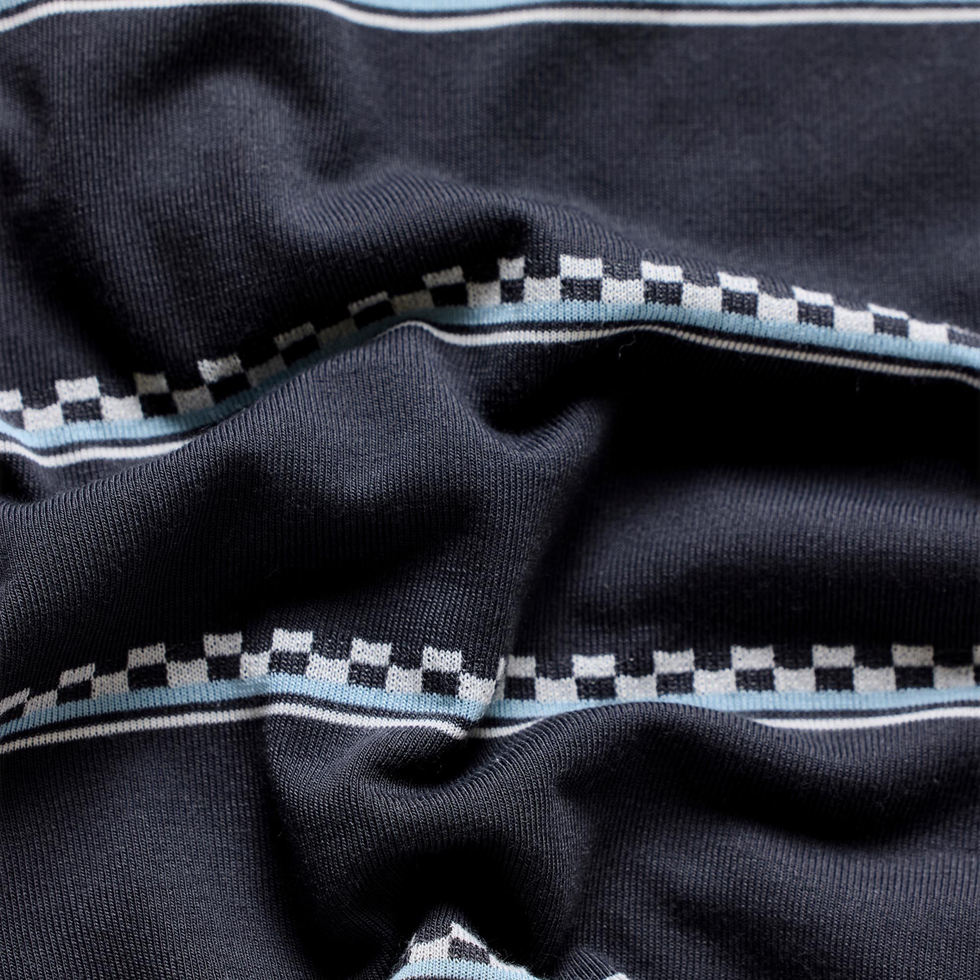Side view of Troy Lee Designs Skyline Ride Checked Out Short Sleeve Bicycle Jersey