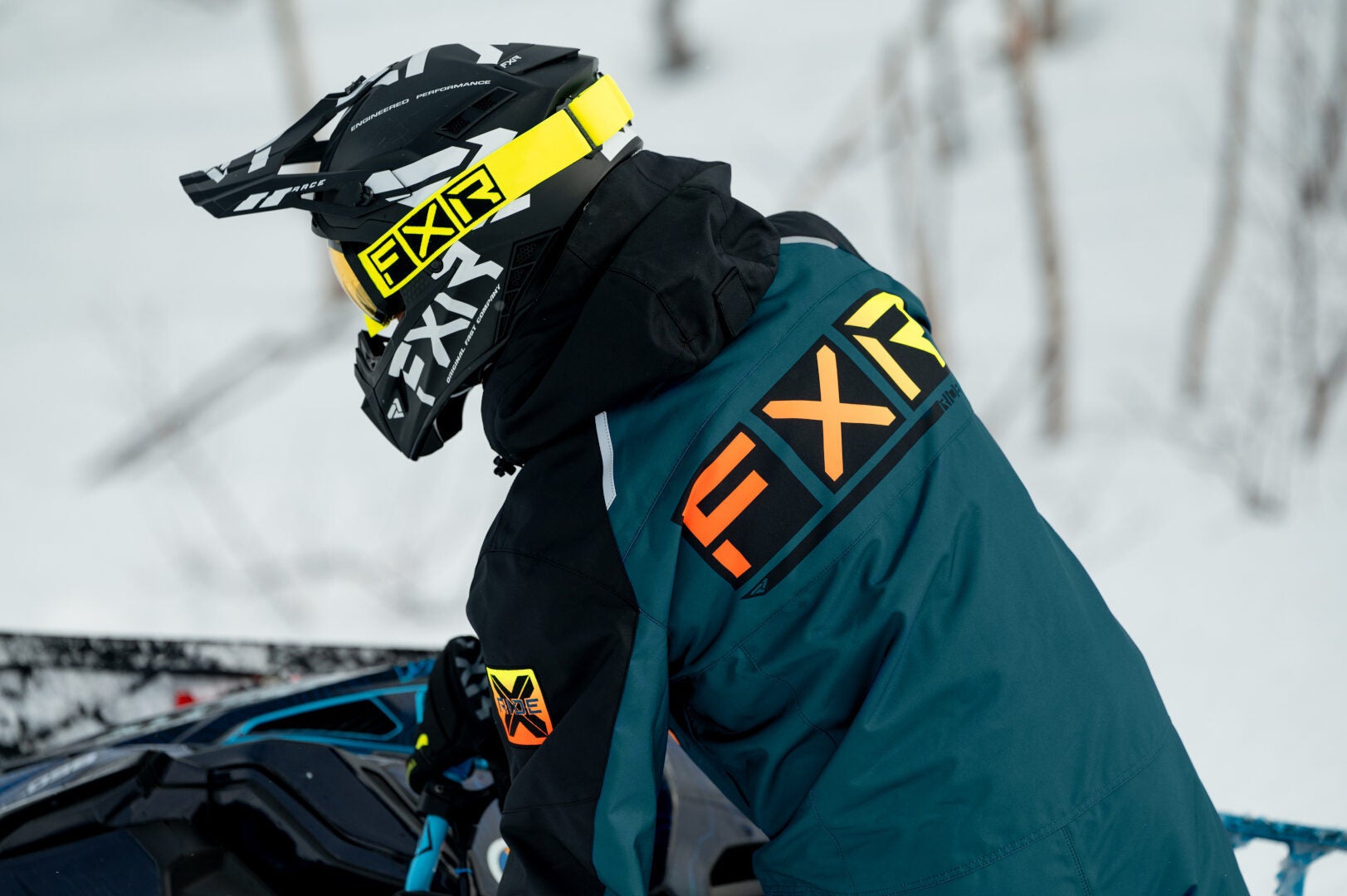 Side view of FXR Recruit Lite 2023 One Piece Snowmobile Suit