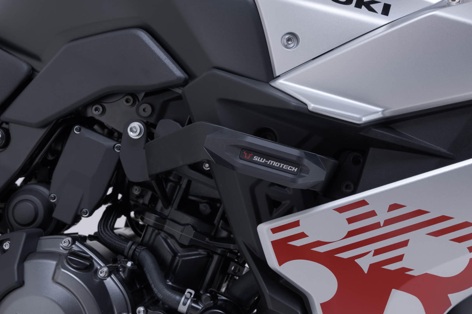 Side view of SW-Motech Frame slider kit - Black. Suzuki GSX-8R (22-25).